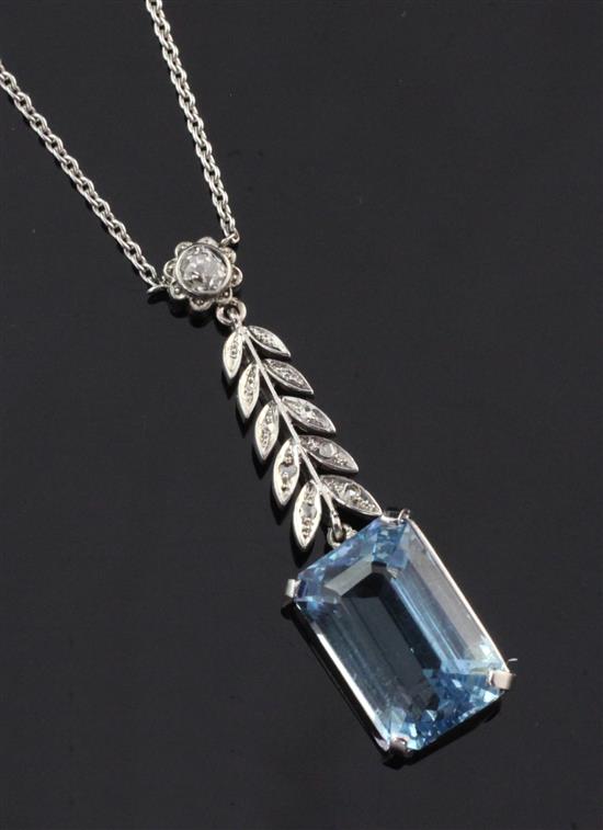 A white gold, aquamarine and diamond set drop pendant on a white metal chain stamped 950, pendant 1.5in.